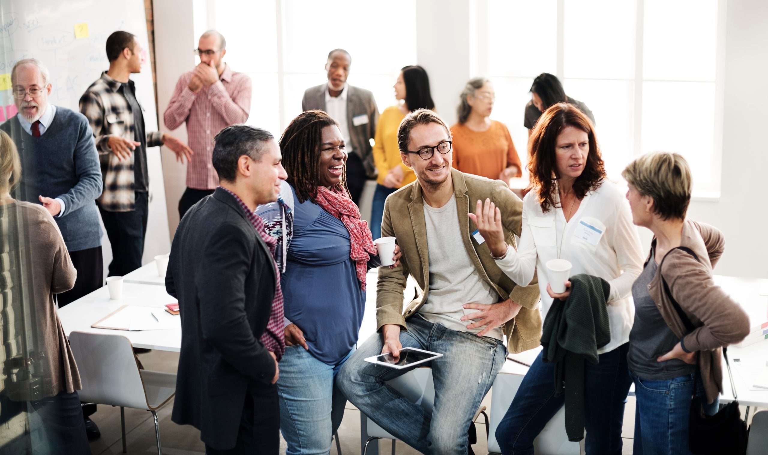 a diverse group of workers in an office